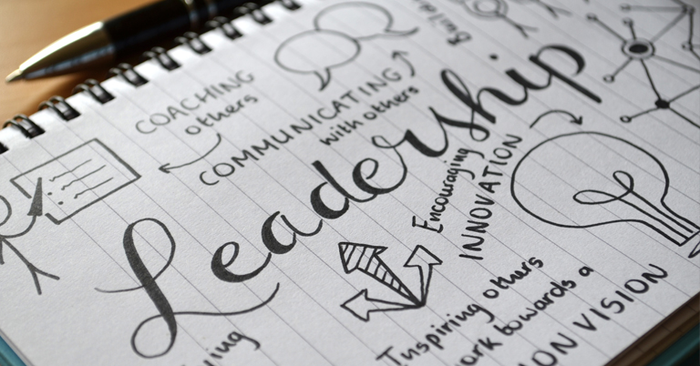 "Leadership" and other related words written on a paper