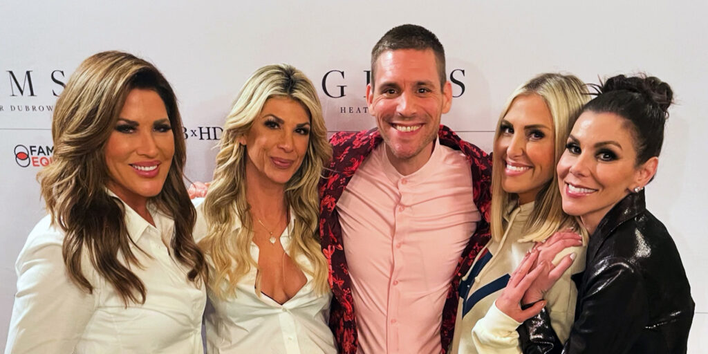 Matthew Ramsey (center) with The Real Housewives of Orange County