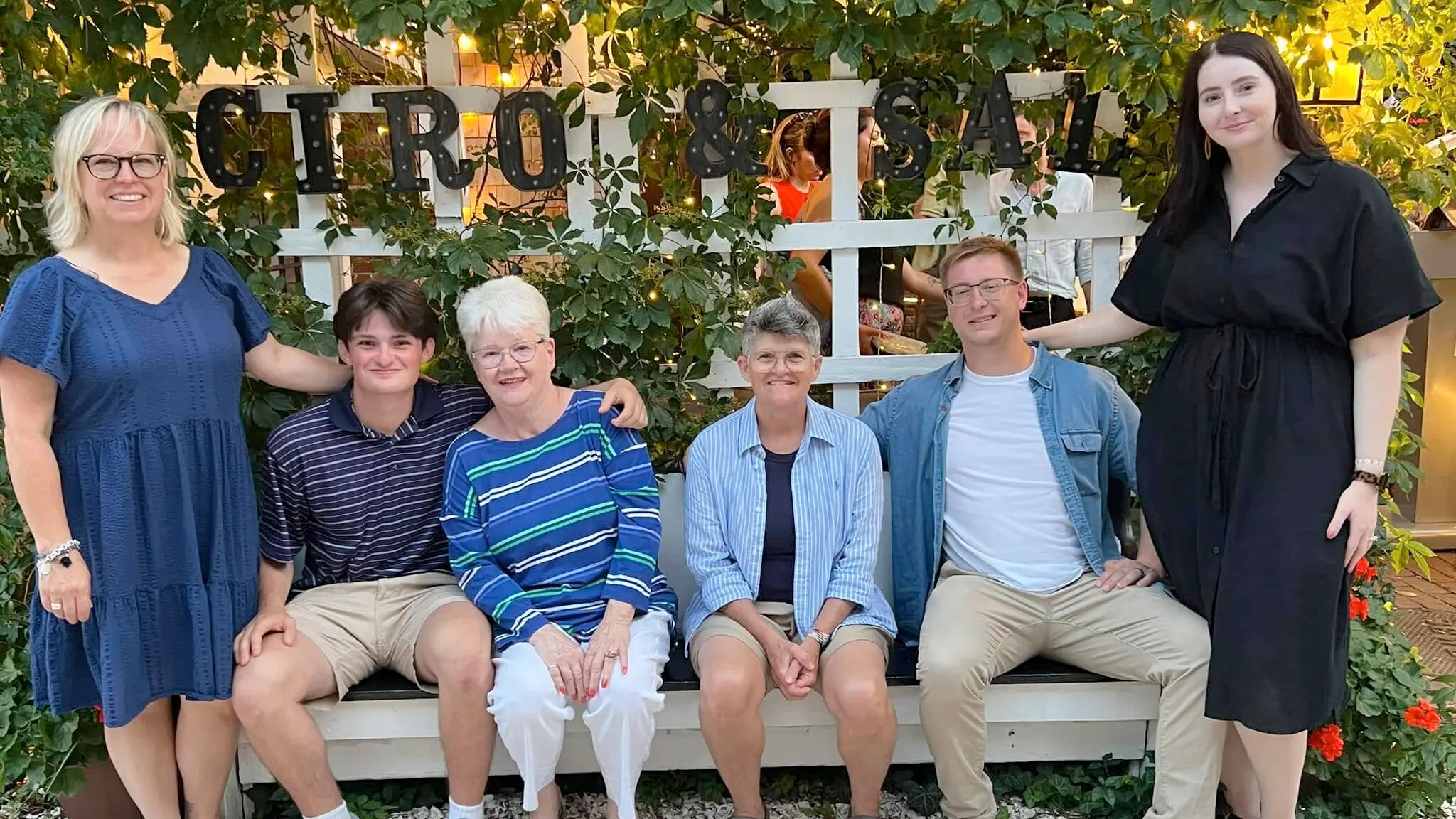Tonya (far left) with (left to right) son Leo, mother-in-law Patricia, wife Amy, son Jesse, and daughter-in-law Chelsey on vacation in 2024