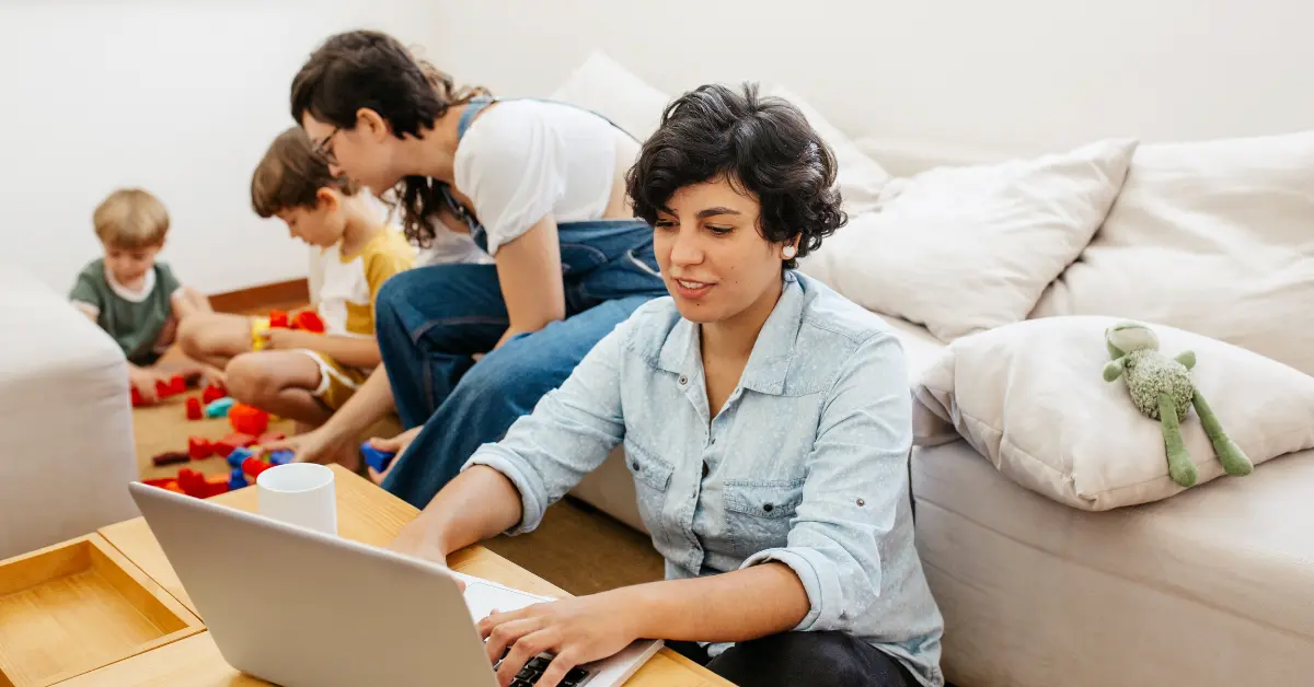 LGBTQ+ parents researching fertility resources on their laptop