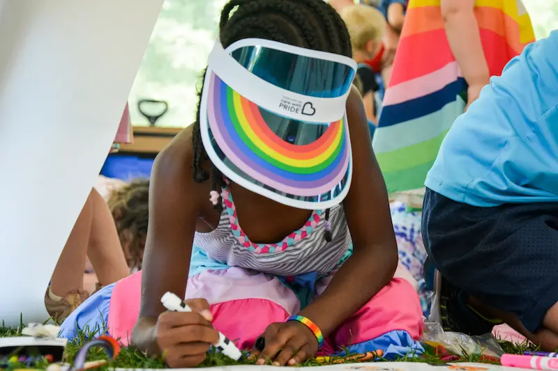CARE WITH PRIDE visor on child drawing