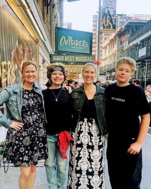 A two-mom family with two children in a city